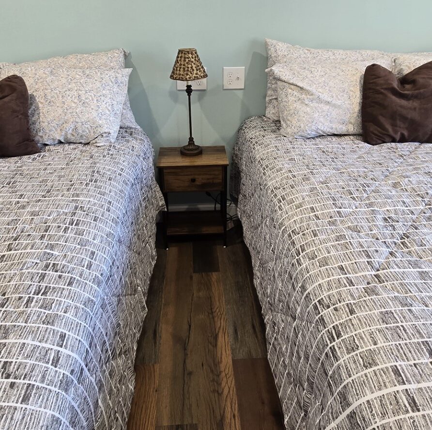 View from foot of beds in Suite 3 at the London Guest House