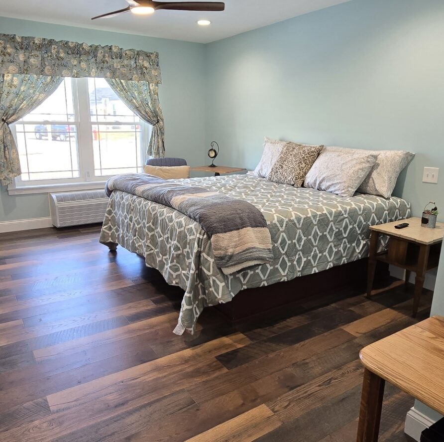 View of kind bed in Suite 4 of the London Guest House