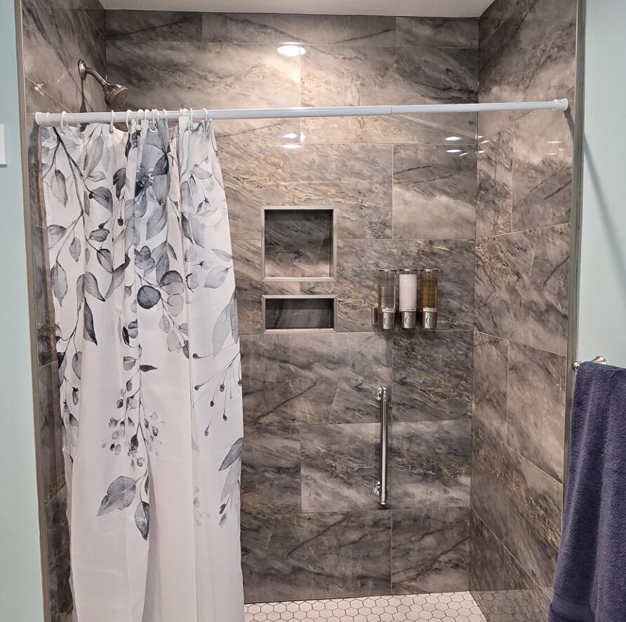 Wide view facing north of shower for private bathroom in Suite 4 at the London Guest House