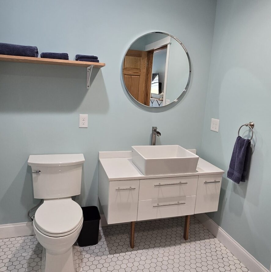 Tall view of private restroom facilities for Suite 4 at the London Guest House